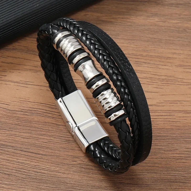 Pulsera de 3 tiras negra con apliques en plateado