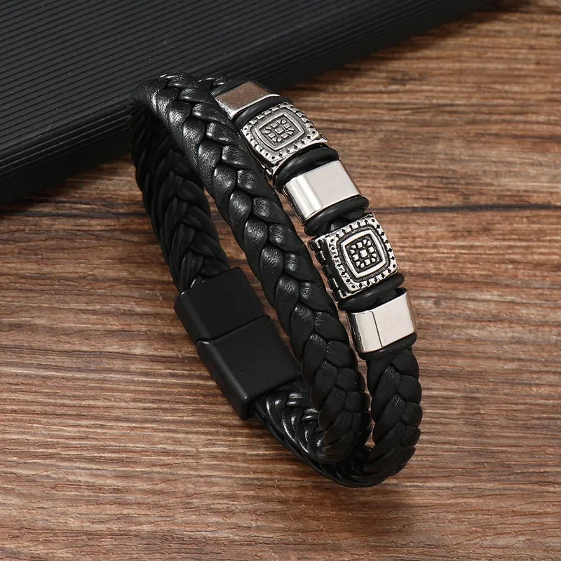 Pulsera negra doble trenza con apliques y dijes