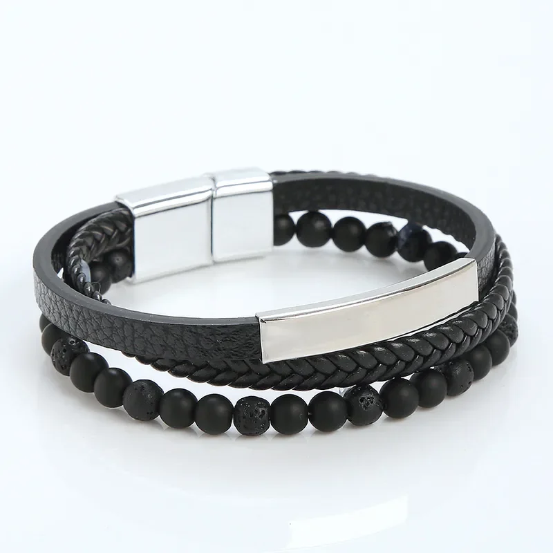 Pulsera negra con piedra volcánica y aplique plateado