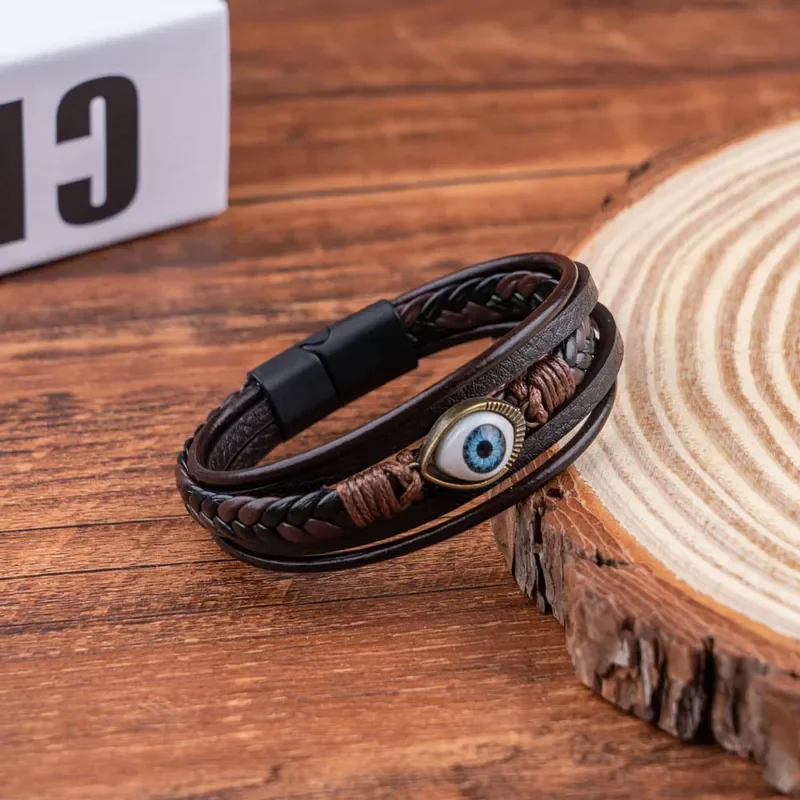Pulsera marrón de 5 tiras y dije de ojo