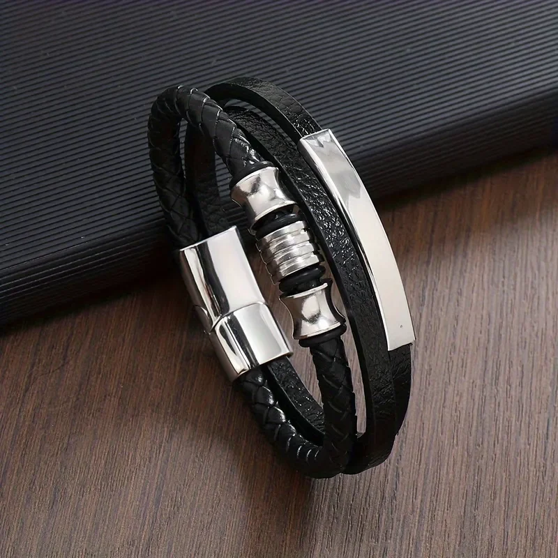 Pulsera triple negra con apliques plateados