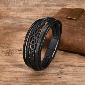 Pulsera negra de 5 tiras con dije clave de Sol