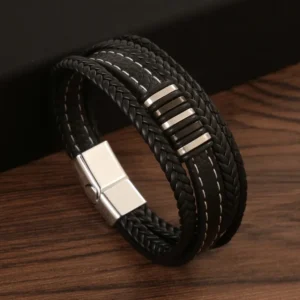 Pulsera negra de 4 tiras apliques plateados y negros