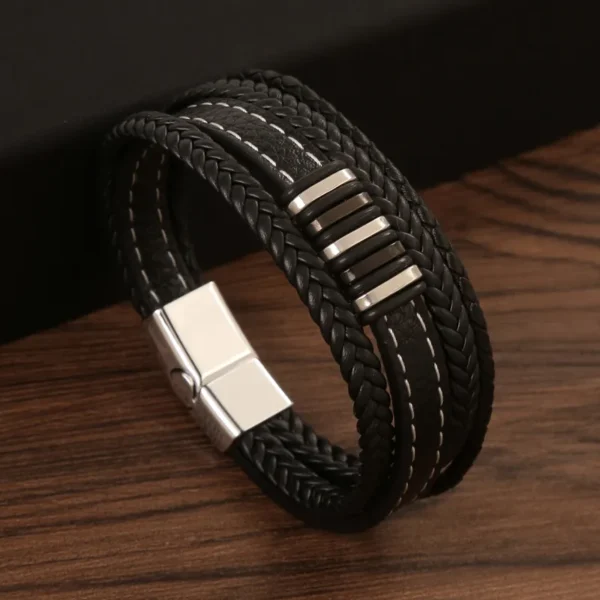 Pulsera negra de 4 tiras apliques plateados y negros