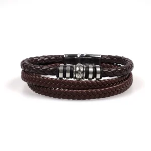 Pulsera triple trenza marrón con dije